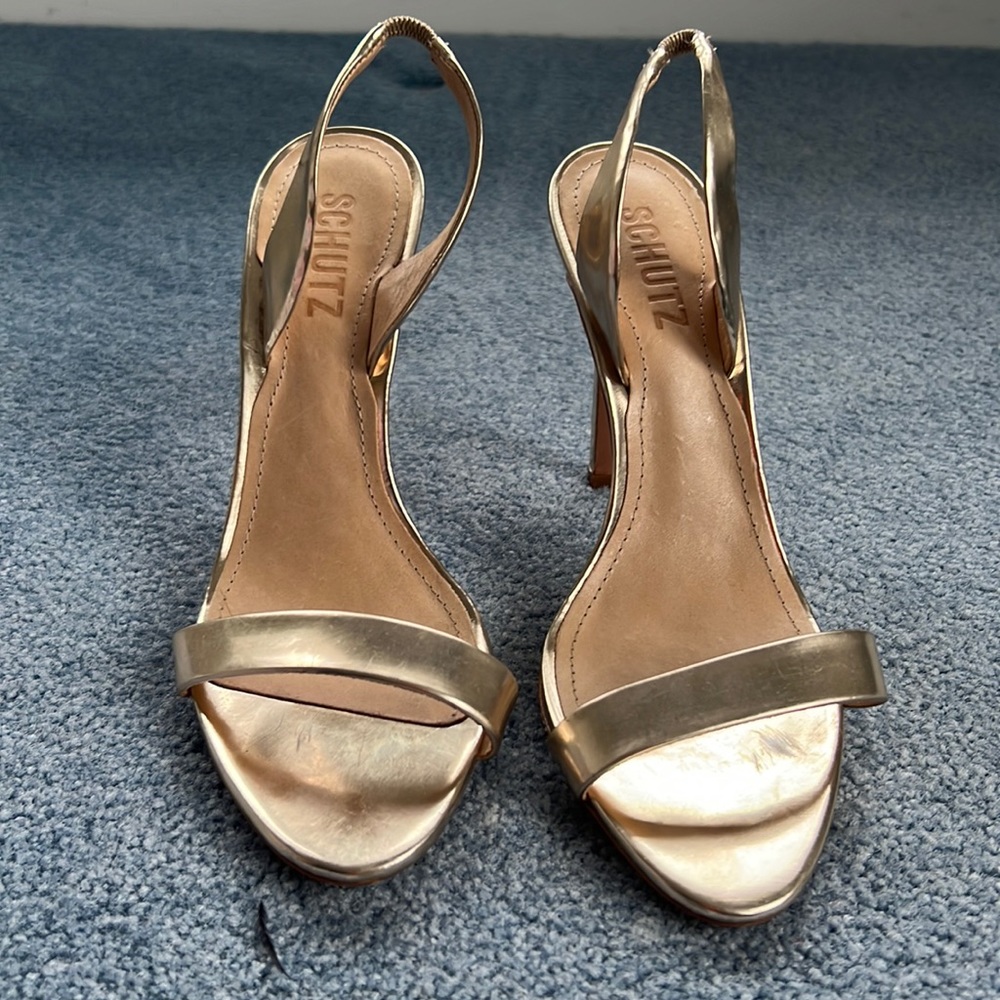Schultz gold heels